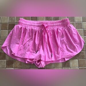 Vibrant Pink Athletic Shorts with Elastic Waistband and Built-in Liner